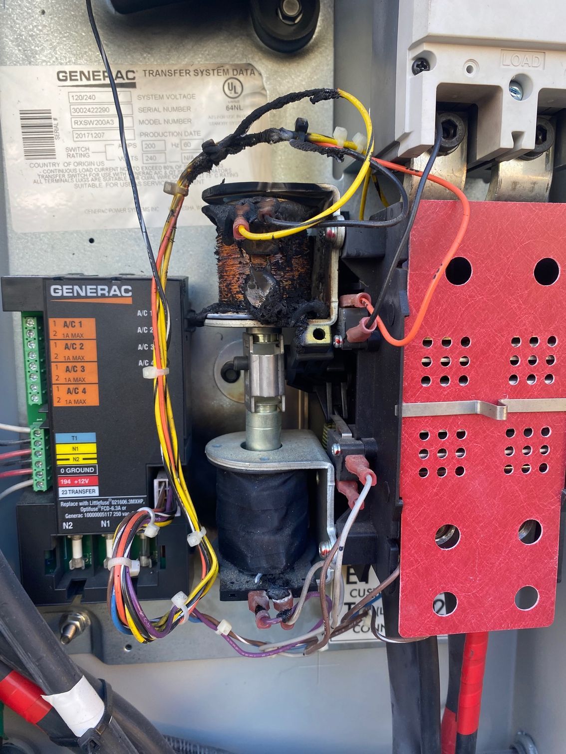 the inside of an electrical box with a lot of wires coming out of it