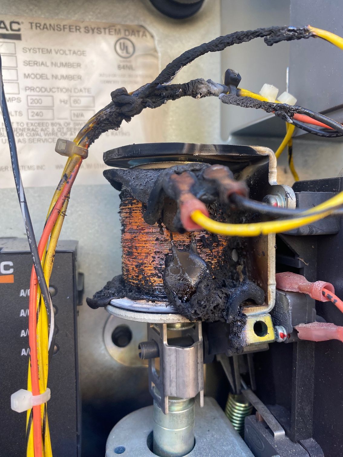 a close up of a coil with wires coming out of it