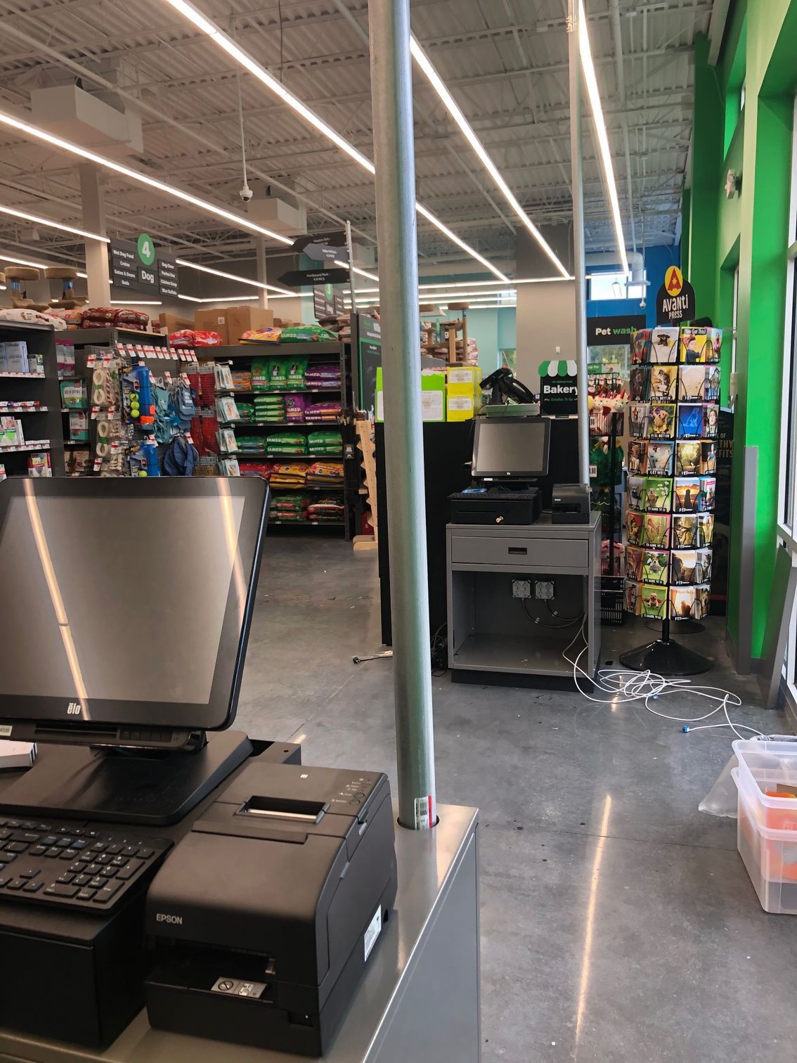 a computer is sitting on a counter in a store