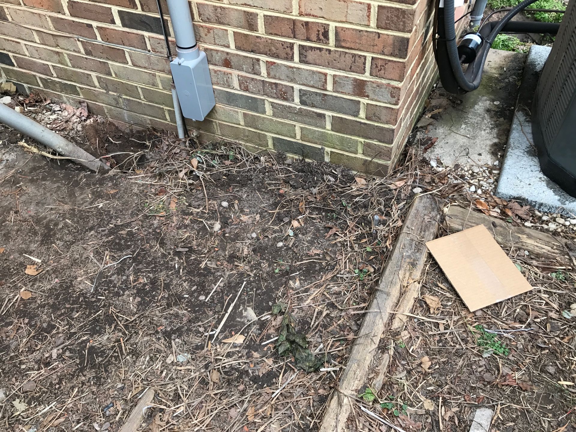 a brick building with a bicycle parked in front of it 