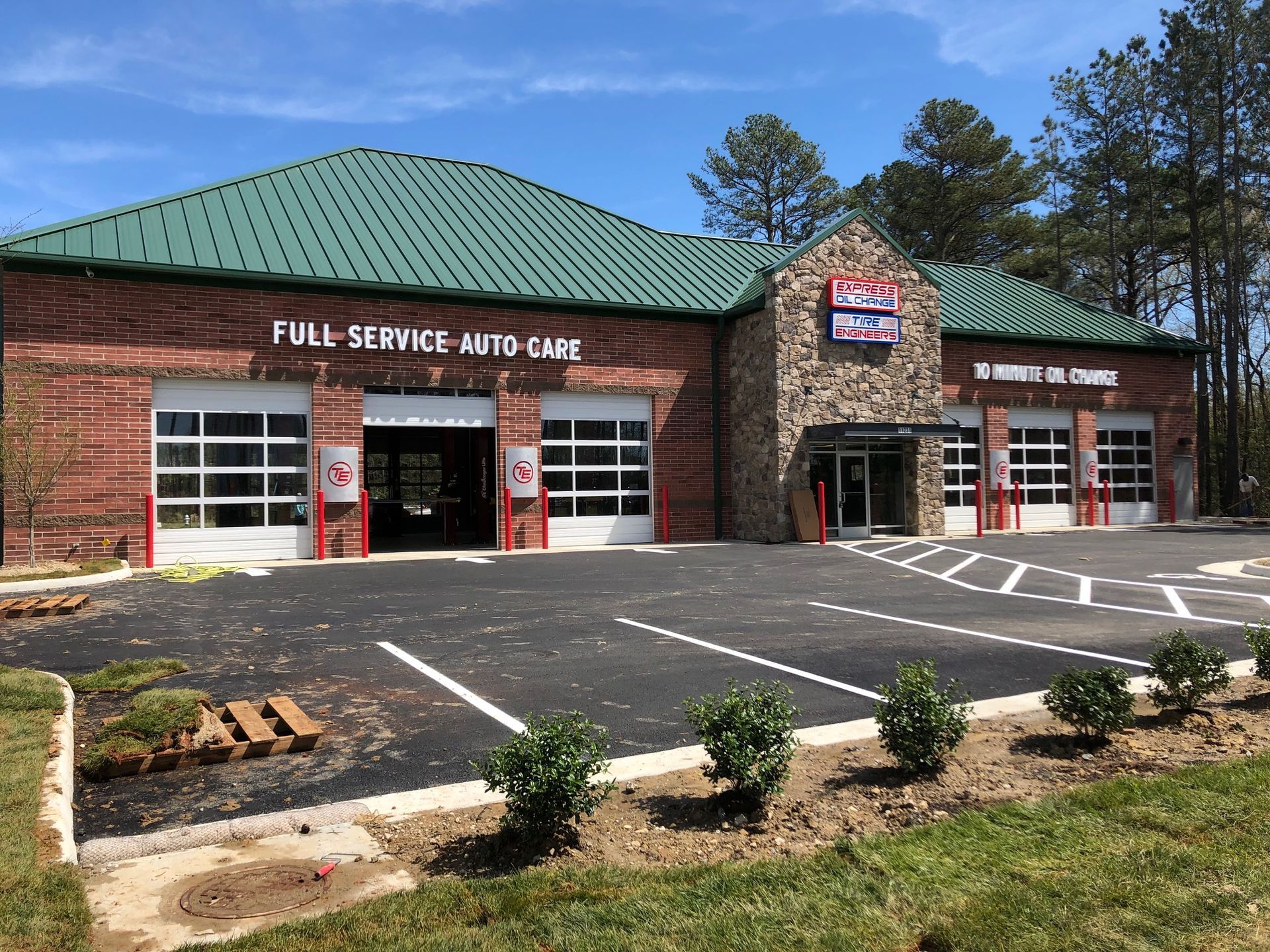 a full service auto care shop with a green roof