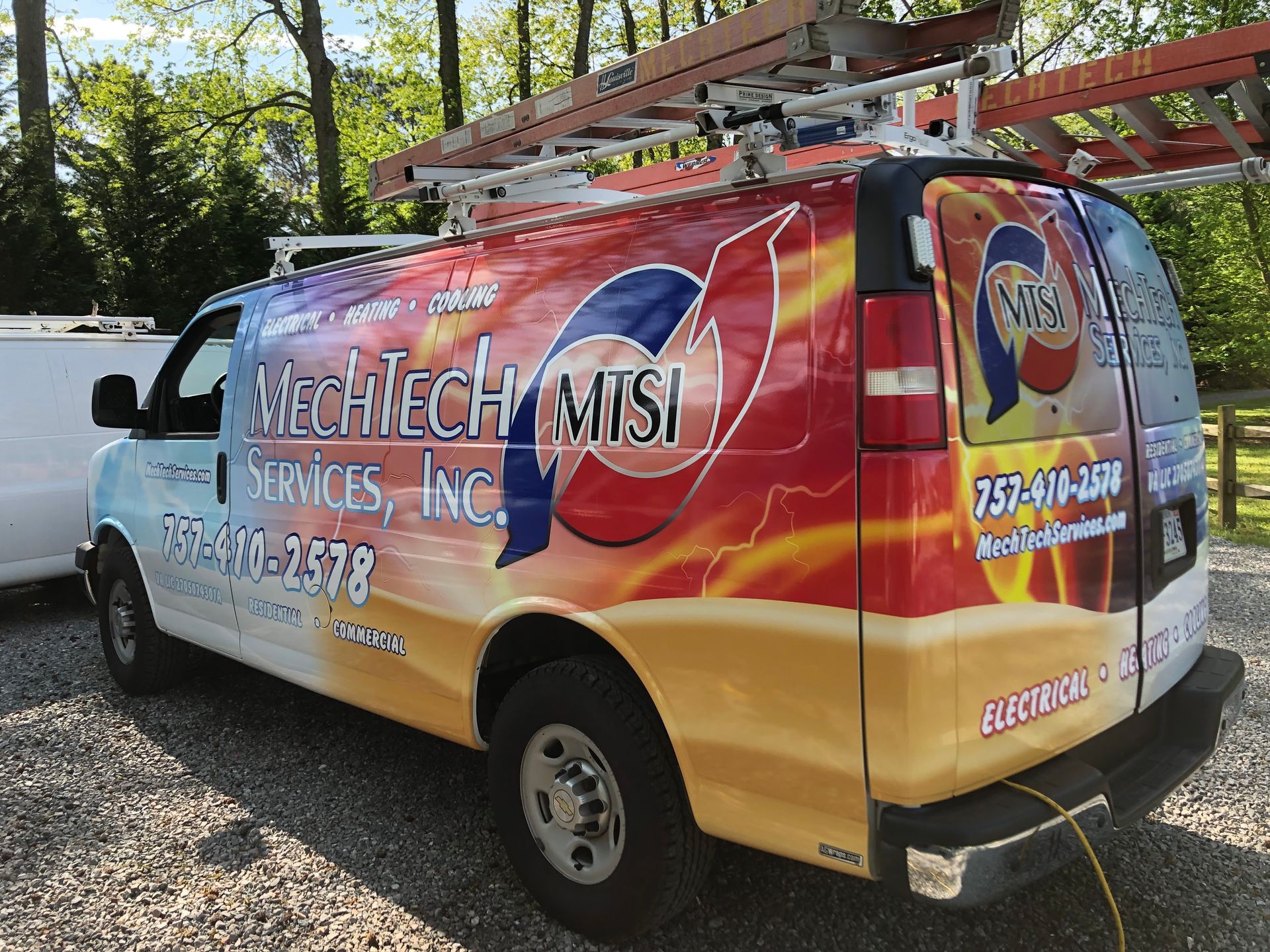 a colorful van with the word electrical on it