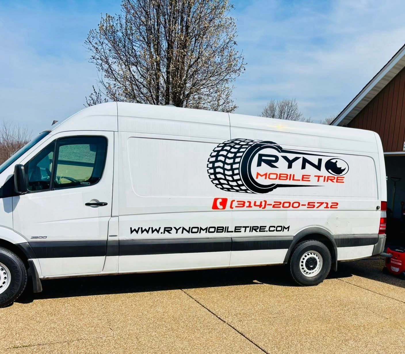 White RYNO Mobile Tire service van parked outdoors on a sunny day