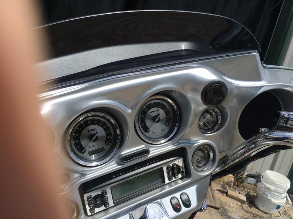 A close up of the dashboard of a motorcycle