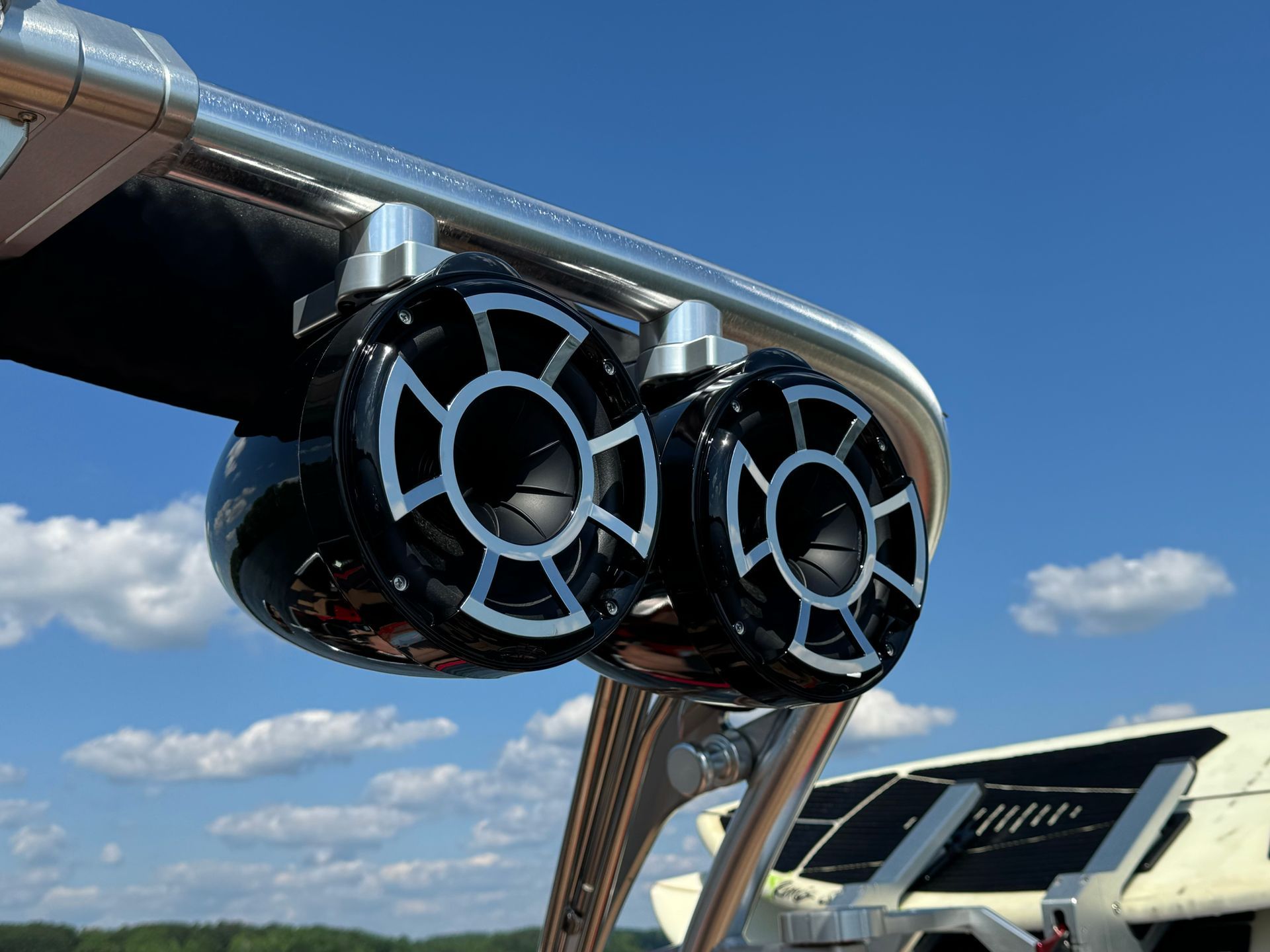 A pair of speakers mounted on the side of a boat