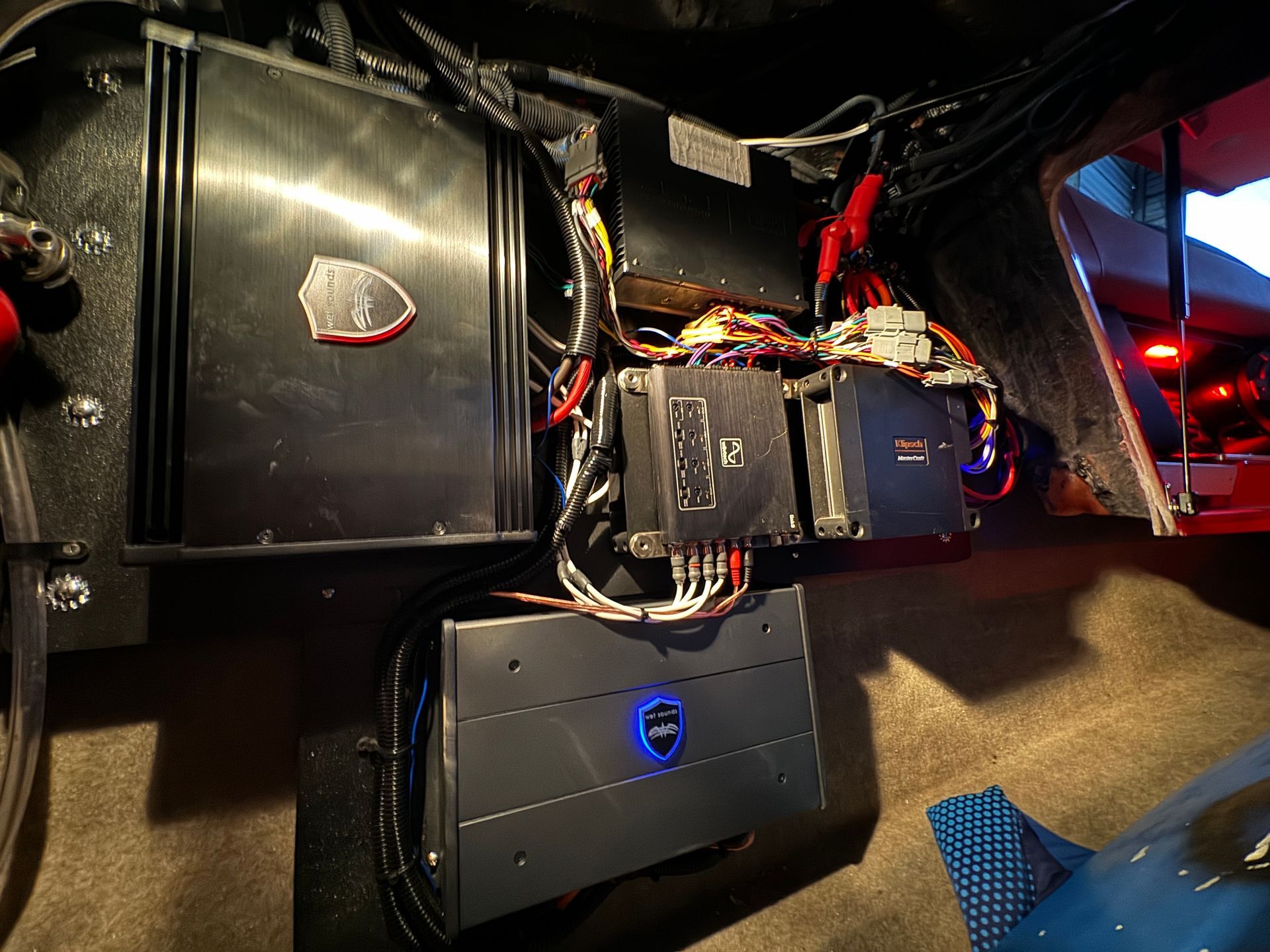 A car with a lot of wires coming out of it