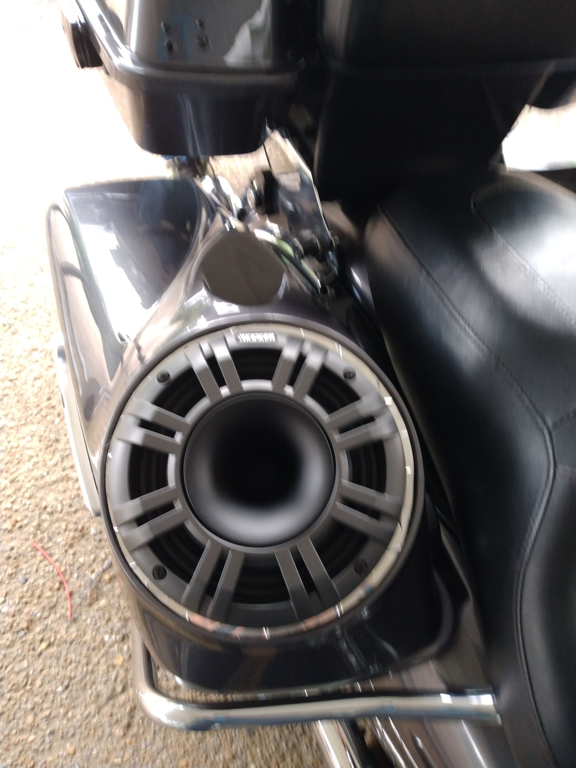 A close up of a speaker on a motorcycle