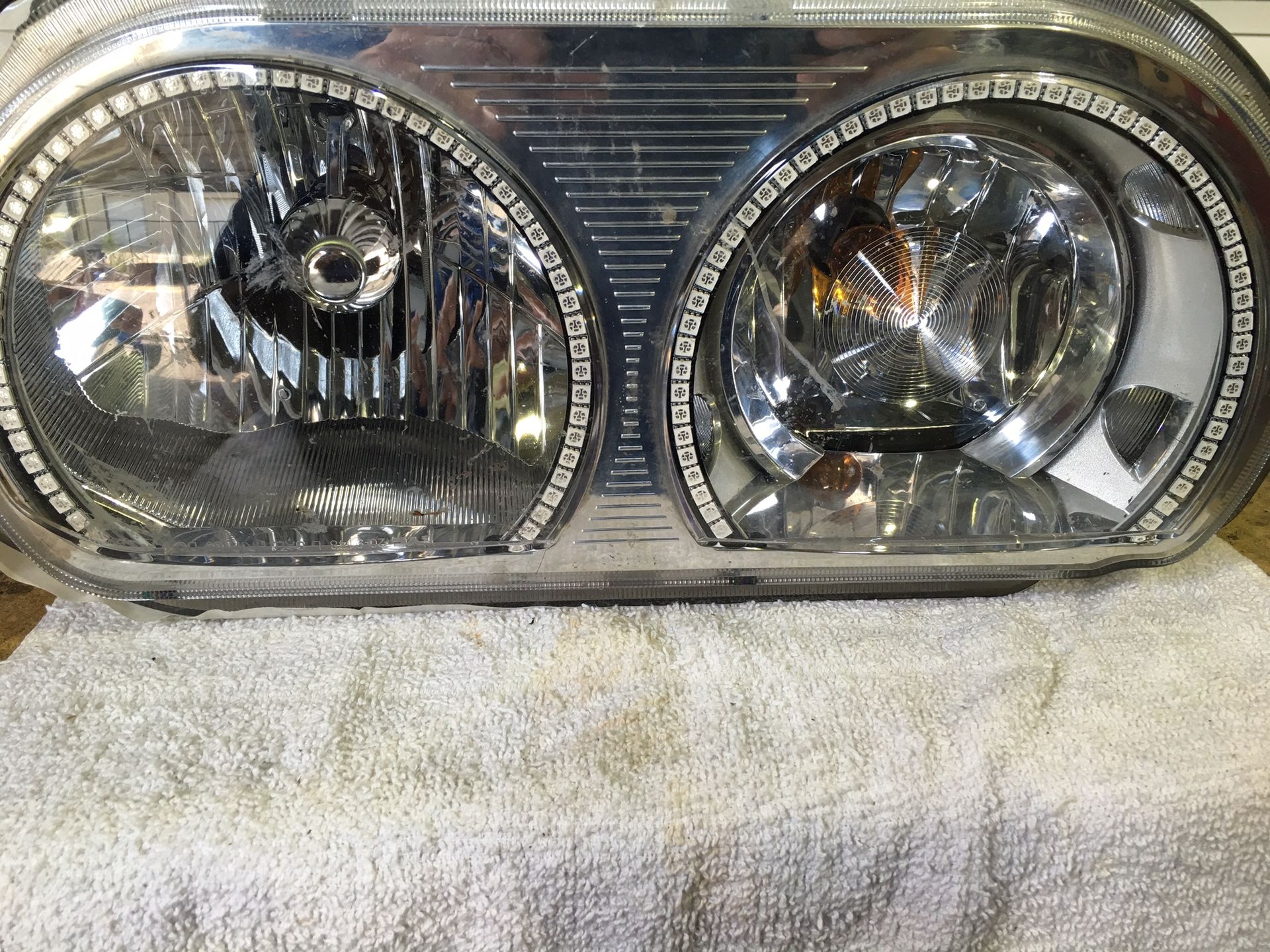 A close up of a headlight on a towel
