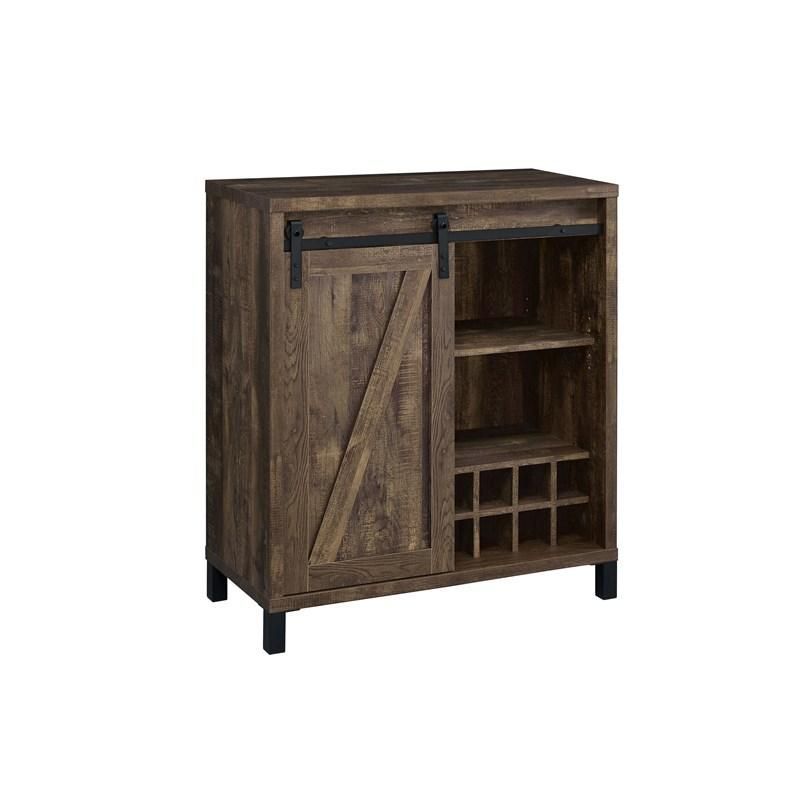 A wooden cabinet with a sliding barn door and wine rack.
