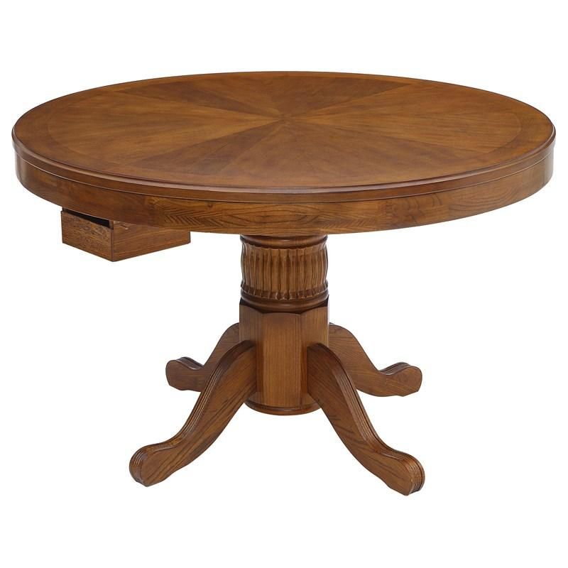 A round wooden table with a drawer underneath it