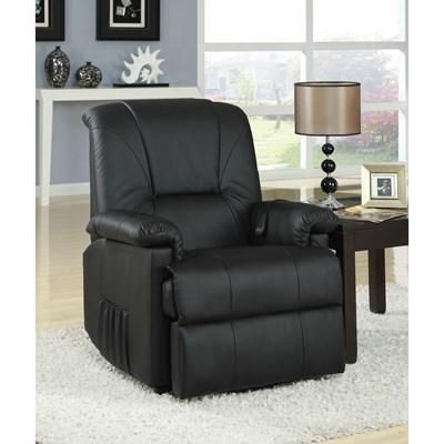 A black leather recliner is sitting in a living room next to a lamp.
