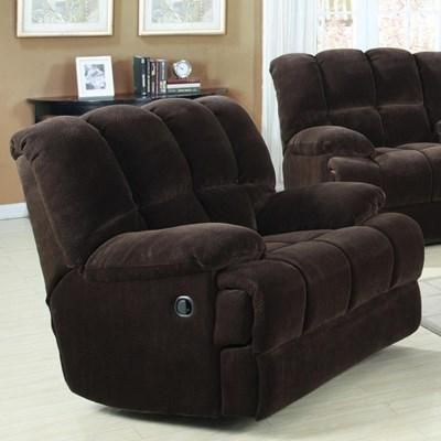 A brown recliner is sitting in a living room next to a couch.