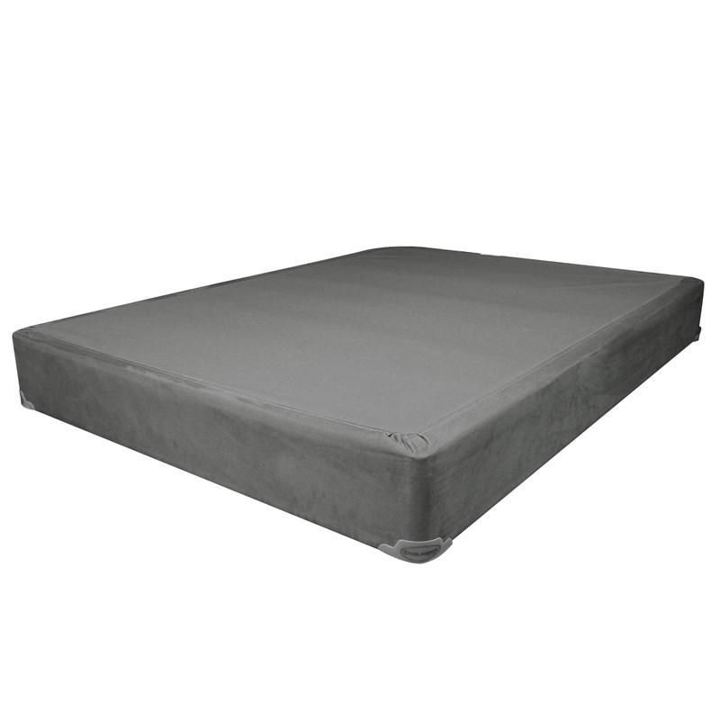 A mattress is sitting on top of a gray box on a white background.