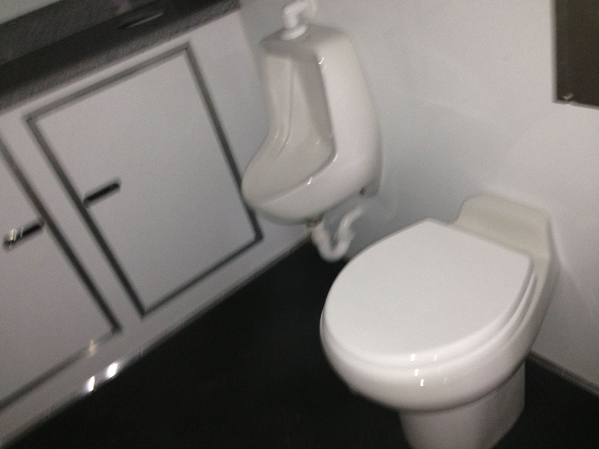 Inside the VIP trailer of a portable toilet