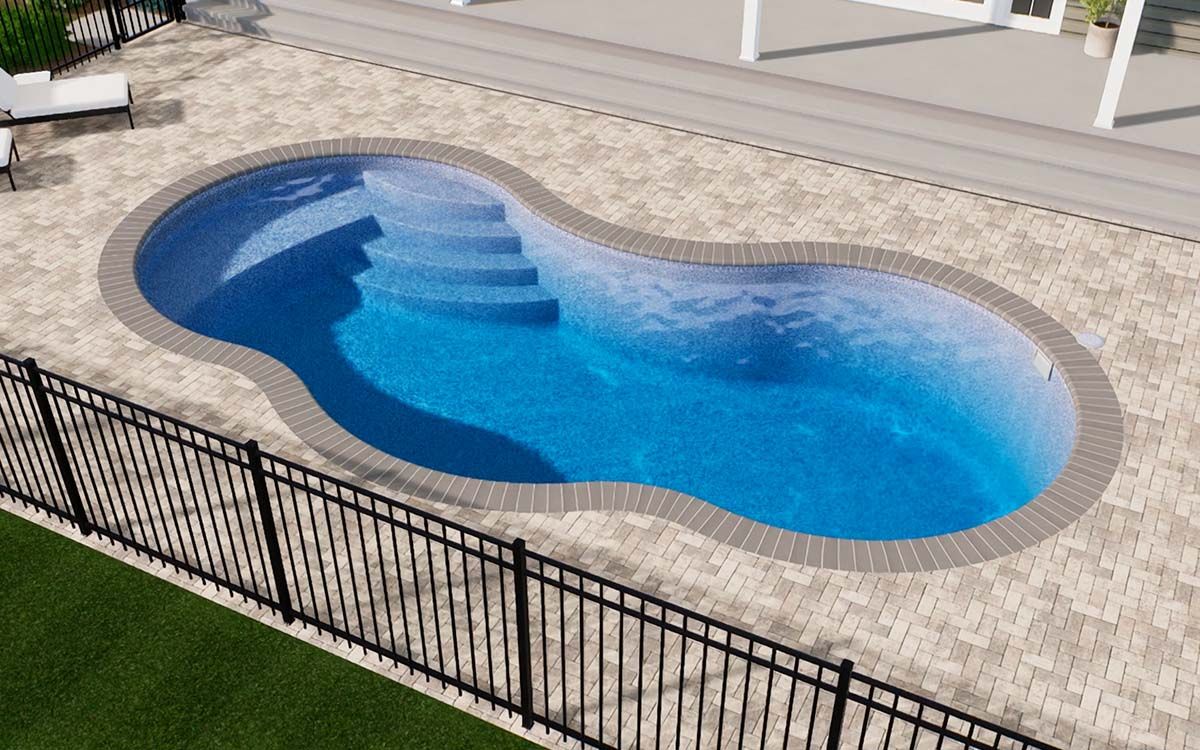 Swimming pool with blue water and steps surrounded by brick and black fence.