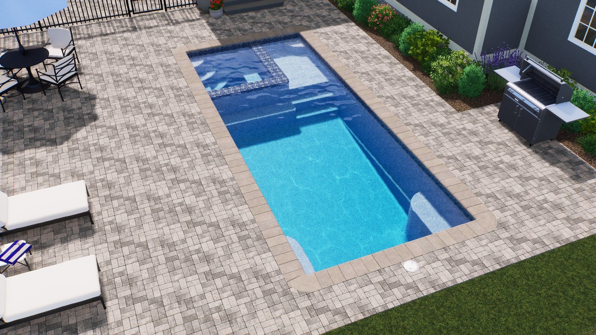 Rectangular in-ground swimming pool surrounded by a patio and landscaping.