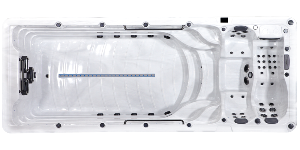 Top-down view of a rectangular, white dual-zone swim spa with a large swimming area and a section with molded seating.