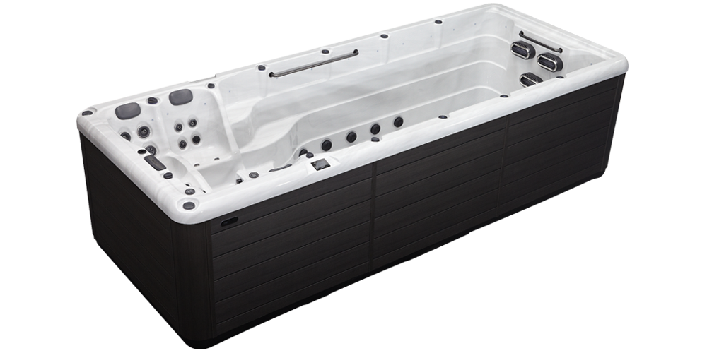 A black rectangular swim spa with a white interior, including built-in seats, jets, and a long swimming area.