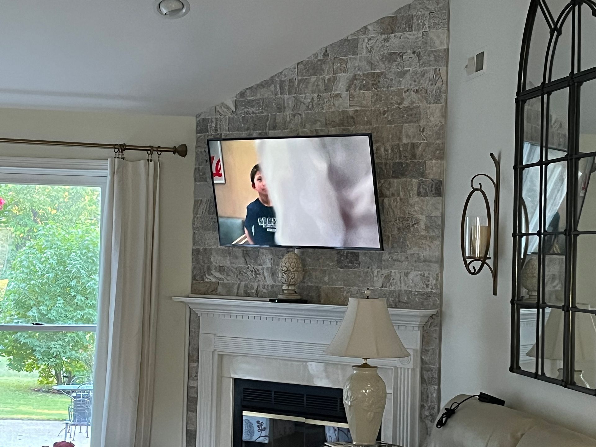 Living room with a TV on the wall