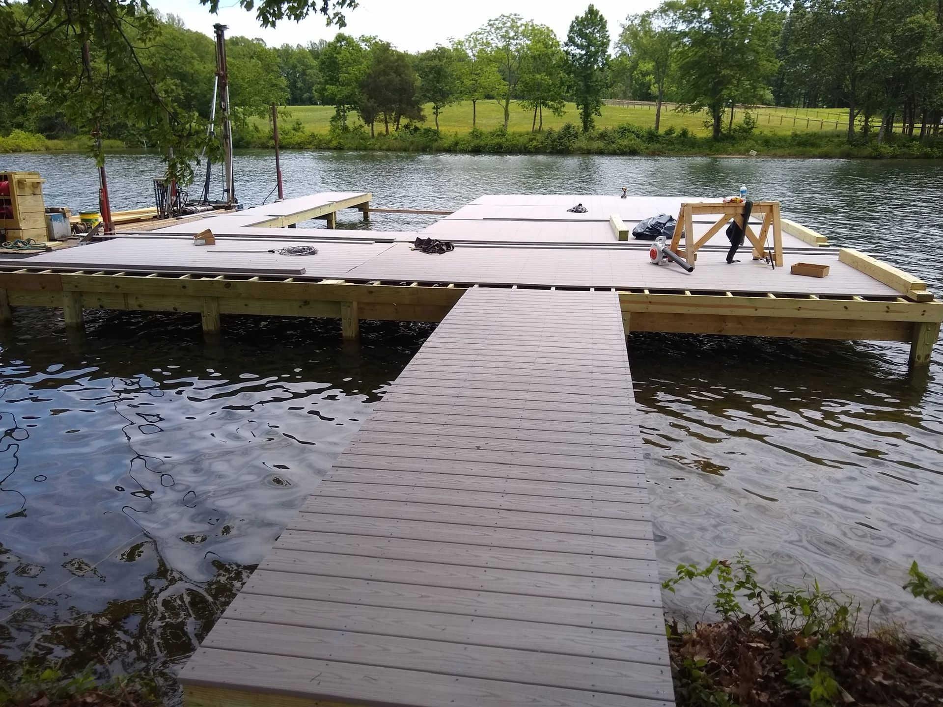 A dock is being built in the middle of a lake