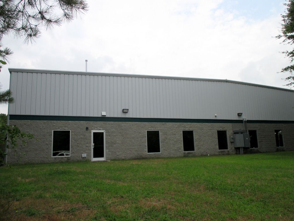 A large building with a lot of windows and doors