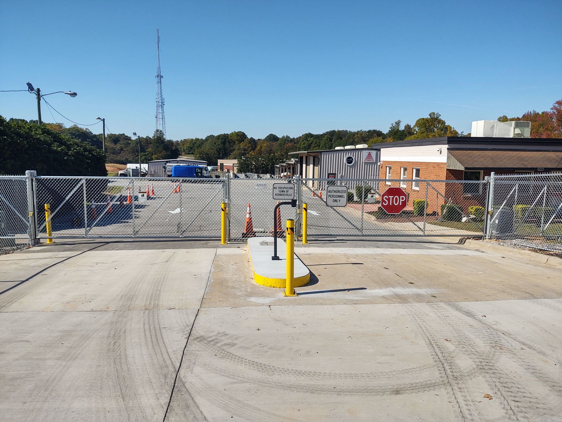 a stop sign in the middle of a parking lot