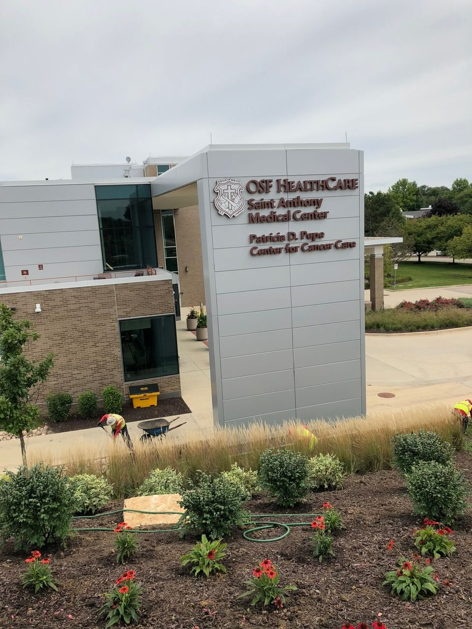 OSF Healthcare Saint Anthony Medical Center, Patricia D. Pepe Center for Cancer Care, with outdoor landscaping.