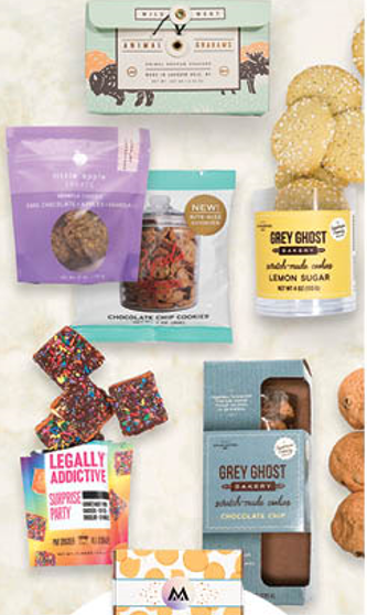 A table topped with a variety of snacks including legally addictive hot nuts