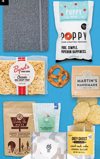 A bag of poppy popcorn sits on a blue surface