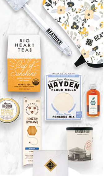 A table topped with a variety of products including big heart teas and hayden flour mills