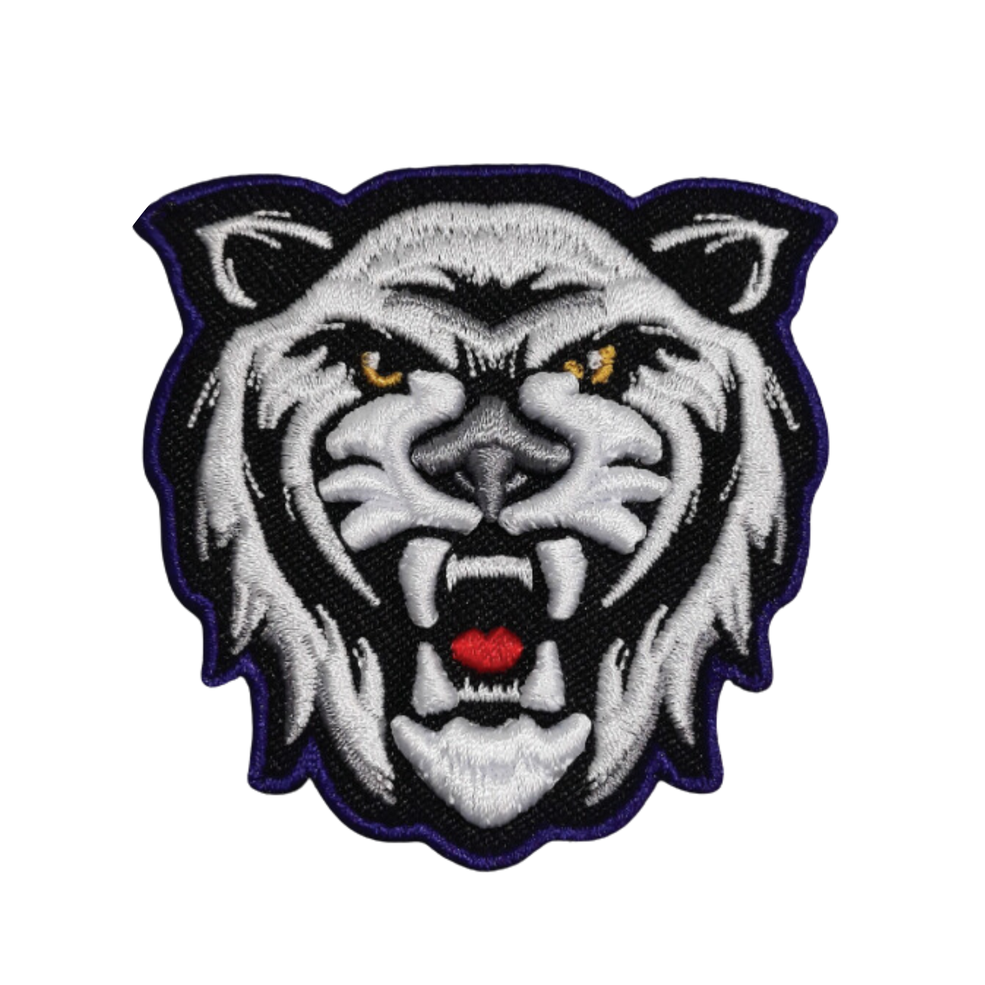 A black and white patch of a tiger 's head with its mouth open.