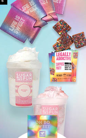 A display of sugar spoon products with a sign that says legally addictive