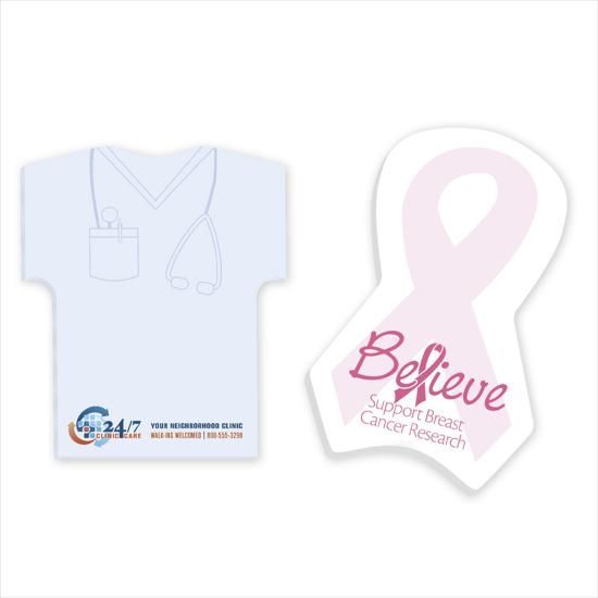 A sticky note in the shape of a scrub top and a pink ribbon with the words `` believe '' on it.