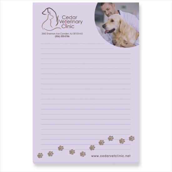 A notepad with a picture of a doctor and a dog on it.