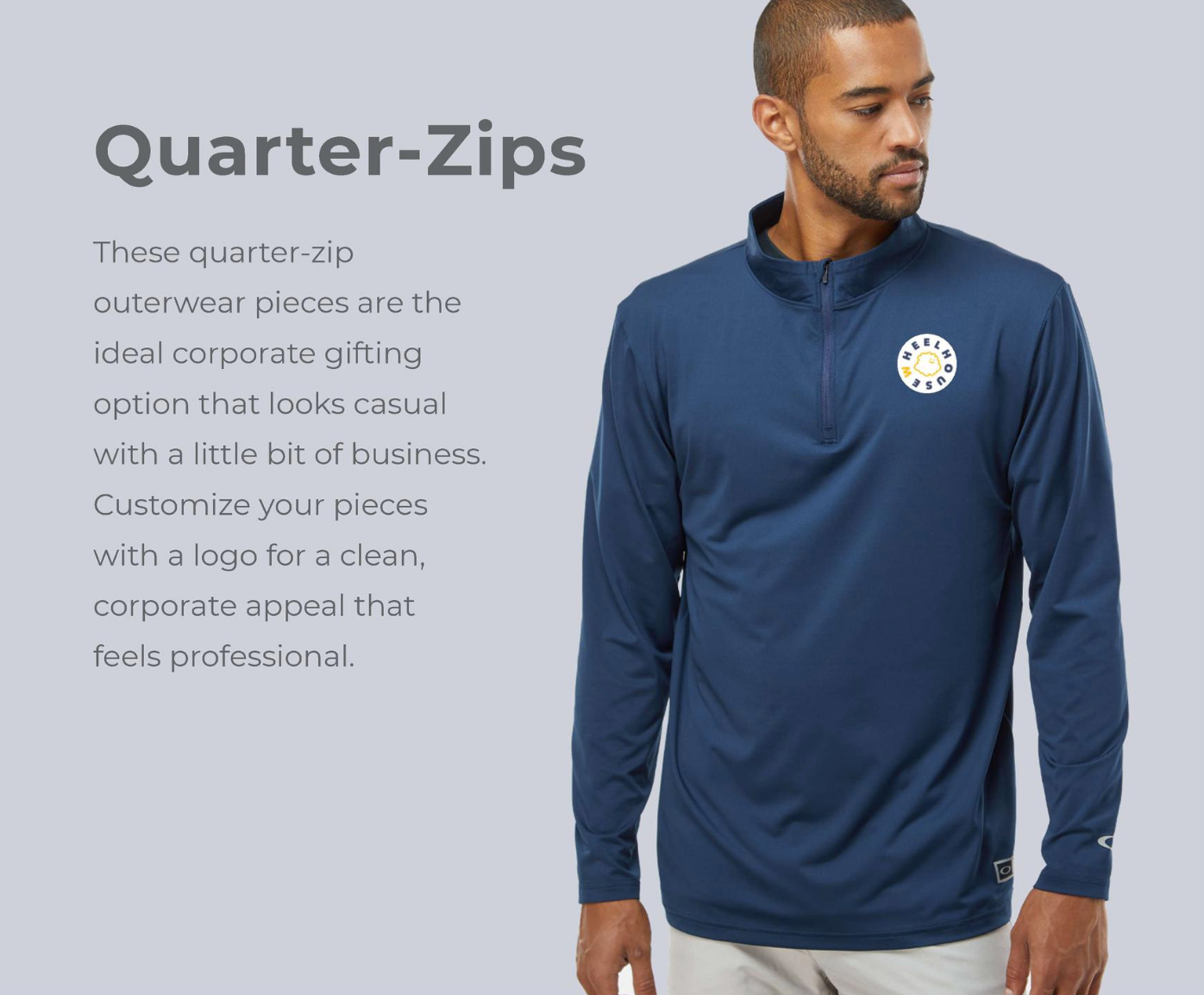 A man is wearing a blue quarter zip sweatshirt.