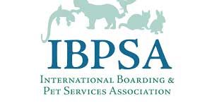 Logo for the International Boarding & Pet Services Association. It features teal animal silhouettes above the letters IBPSA in navy blue.