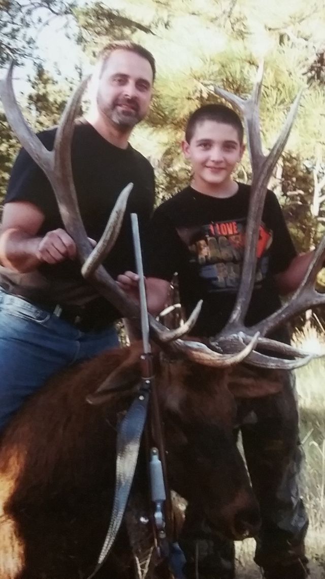 Father and son with their hunt