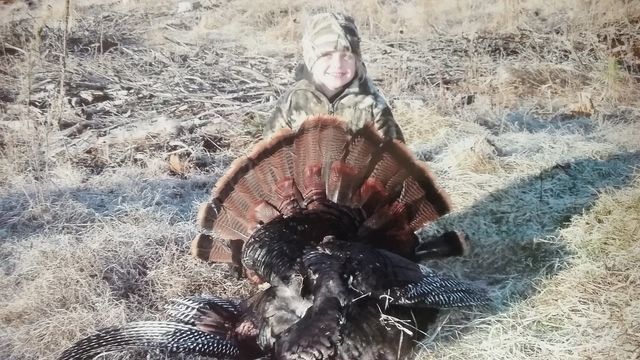 Kid with is hunt