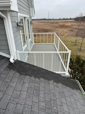 A wooden house balcony deck