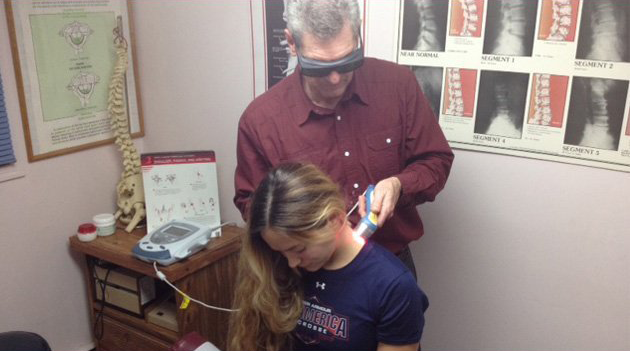 Girl having a cold laser treatment