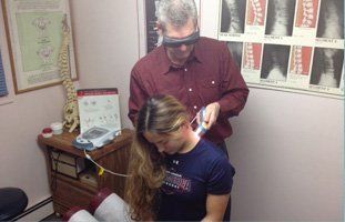 Woman having a cold laser therapy