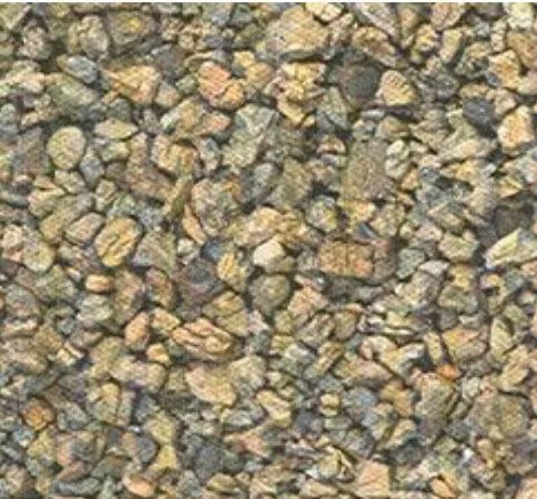 Close-up of small multicolored pebbles covering the ground