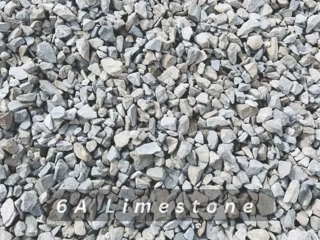 Gray crushed limestone gravel with the label “64 Limestone” at the bottom
