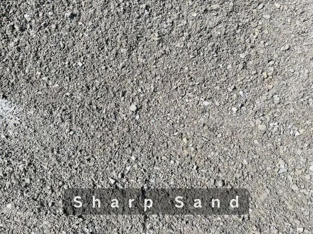 Gray coarse sand labeled “Sharp Sand” in white text near the bottom.
