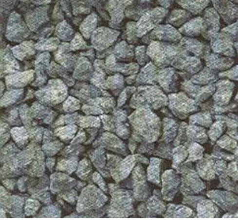 Close-up of gray gravel stones filling the frame