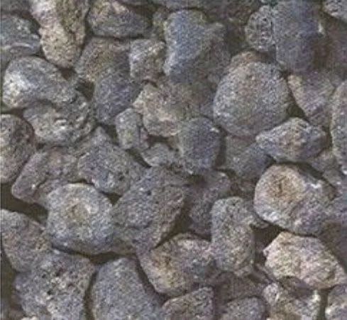 Close-up of rough gray rocks filling the frame