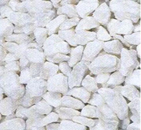 Close-up of white dried flower petals or flakes filling the frame