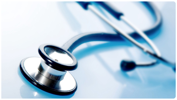 Stethoscope on reflective blue surface