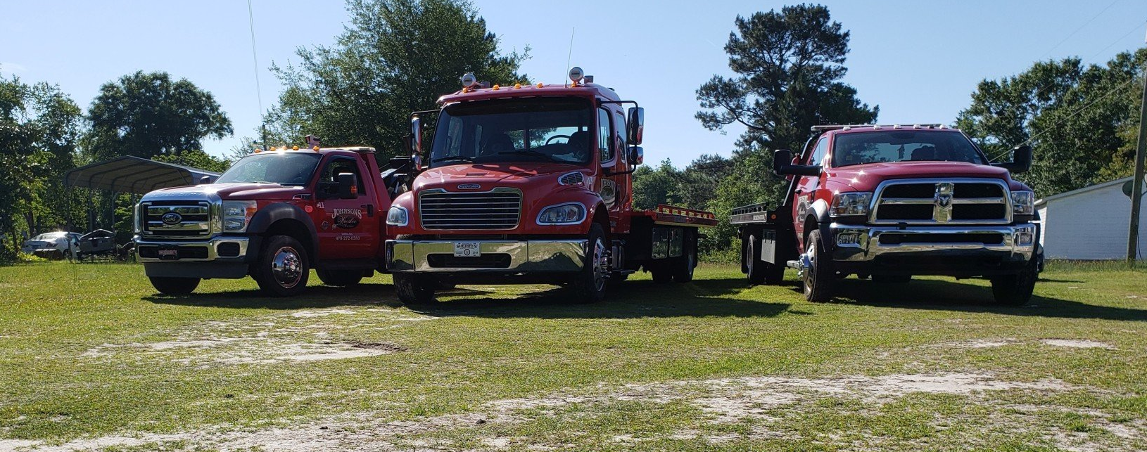 Johnson's Wrecker Service Inc logo