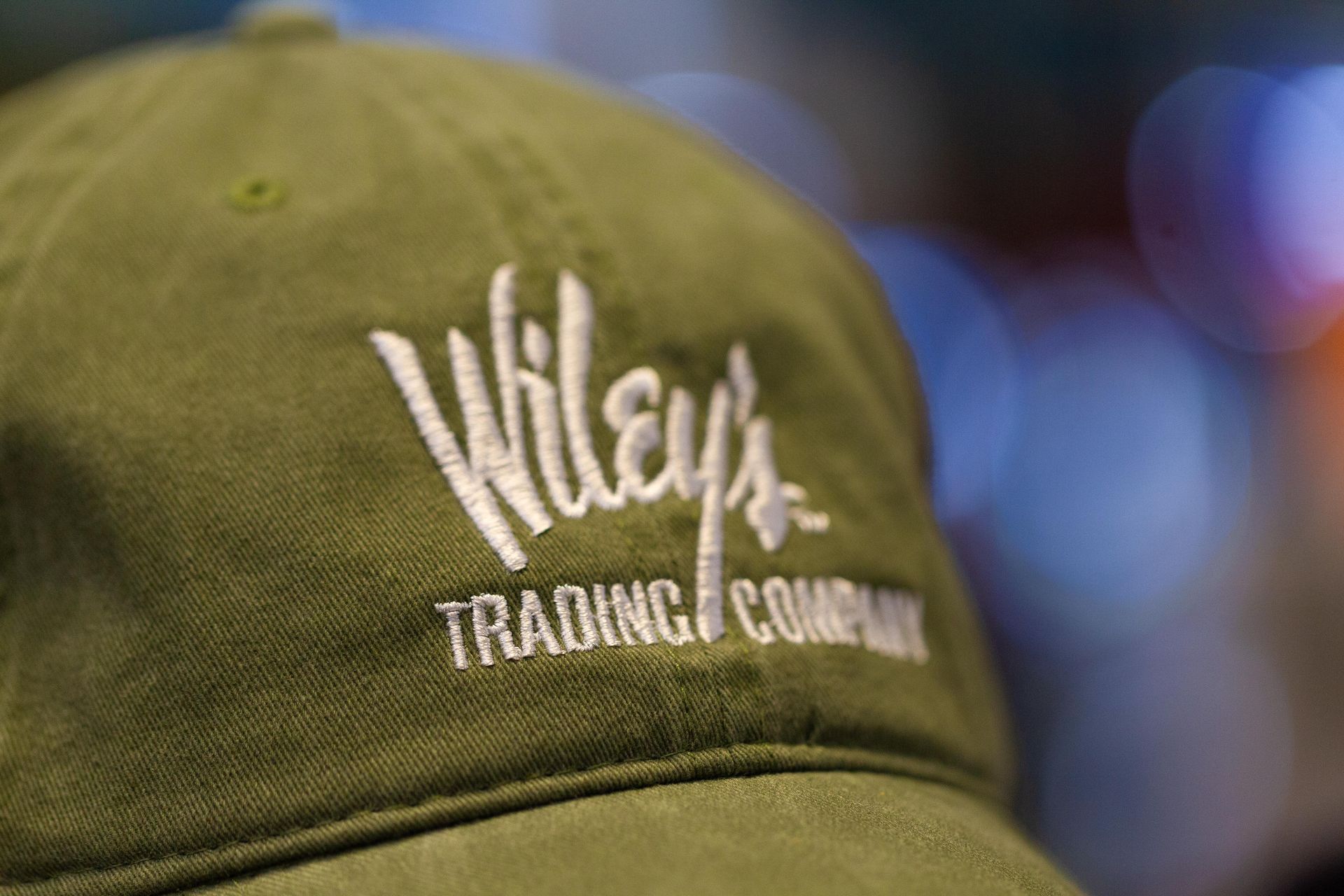 Green baseball cap embroidered with